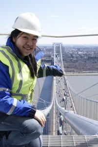 Susie Lai on top of a bridge.